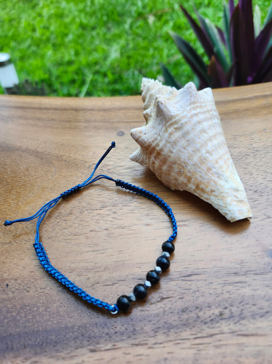Bracelet ref 51 : Cordon réglable œil de tigre bleu / hématite sur cordon tressé bleu