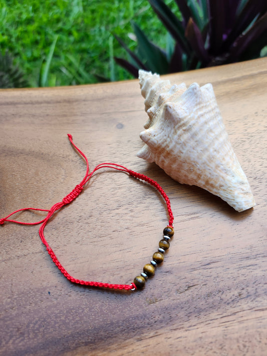Bracelet ref 52 : Cordon réglable œil de tigre marron clair et hématite sur cordon tressé rouge