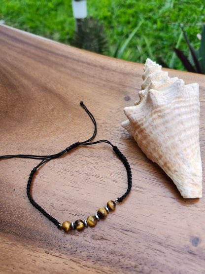Bracelet ref 56 : Cordon réglable œil de tigre marron clair et hématite sur cordon tressé noir